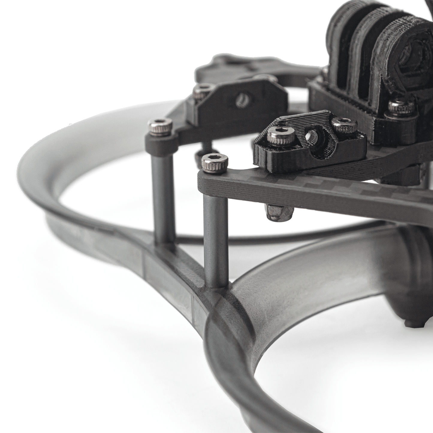 Close-up of standoffs and fasteners connecting top plate to ducted base