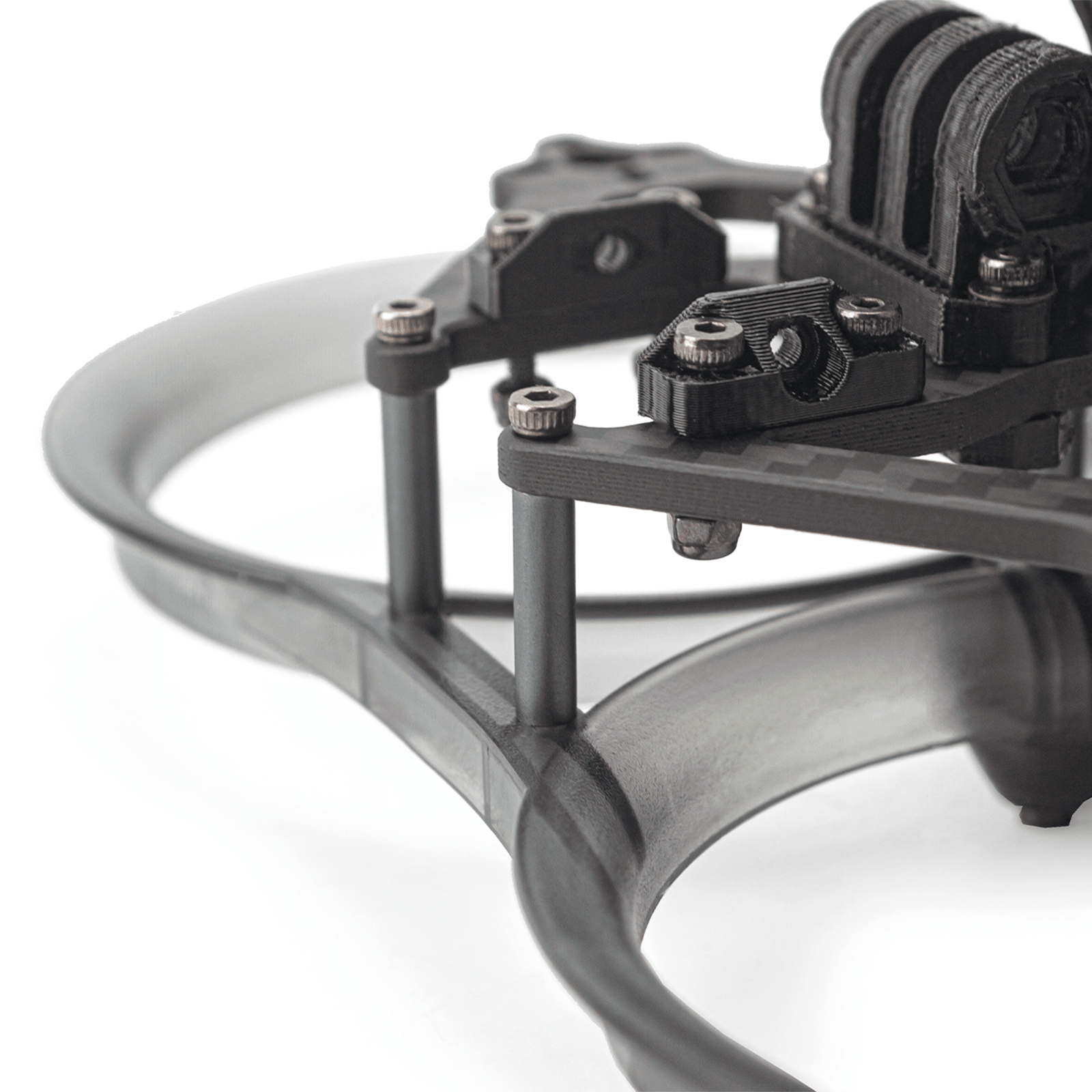 Close-up of standoffs and fasteners connecting top plate to ducted base