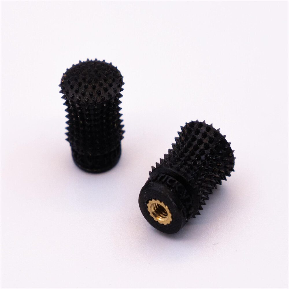 Black spiked stick ends pair, one upright and one angled showing brass threaded insert