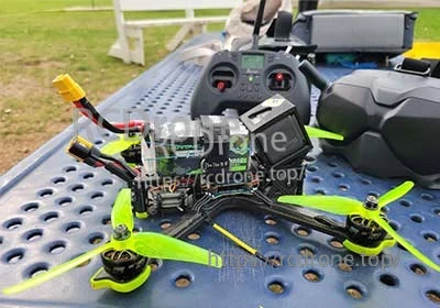 2× Ovonic 1550mAh 4S 14.8V 100C LiPo Battery pack mounted on FPV quad with XT60 lead