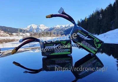 Pair of Ovonic 4S 1550mAh 14.8V 100C LiPo batteries with XT60 connectors outdoors