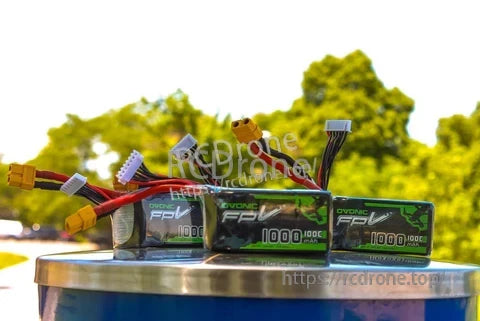 2× Ovonic 6S 1000mAh 22.2V 100C LiPo Battery packs with XT60 and balance leads on table