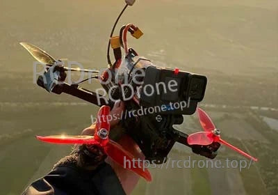 FPV racing quad powered by a 4S LiPo battery strapped on top for flight use