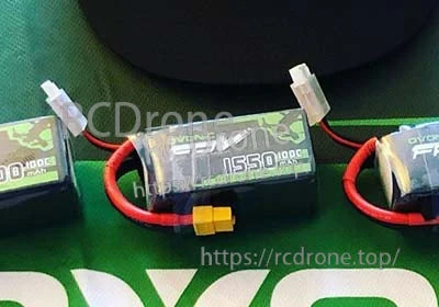 Three Ovonic 1550mAh 6S LiPo packs lined up showing XT60 discharge plug and JST-XHR balance connector