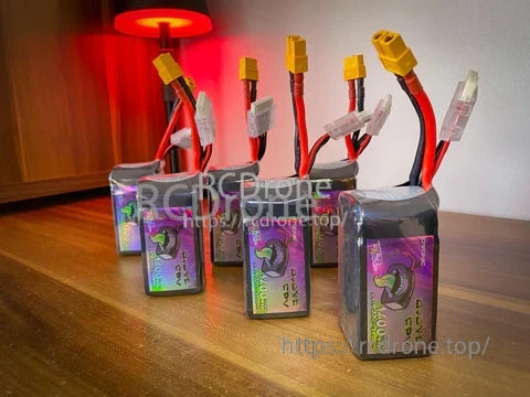 Ovonic Rebel 2.0 FPV LiPo batteries lined up with XT60 discharge plugs and white JST balance connectors