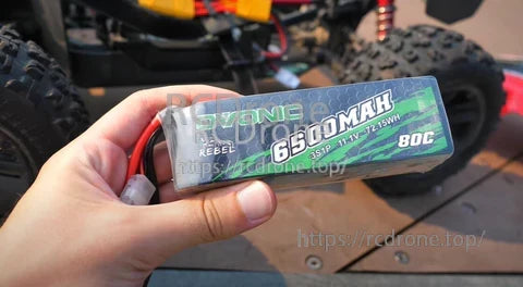 2× Ovonic Rebel 6500mAh 3S 11.1V 80C LiPo Battery pack label in hand, softcase RC battery