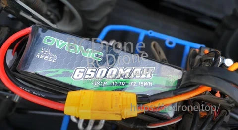 Ovonic Rebel 6500mAh 3S 11.1V LiPo installed in an RC car battery tray, XT90 lead visible