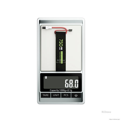 Flywoo Explorer 750mAh 4S LiHV LiPo battery pack on a digital scale reading 68.0g with balance lead
