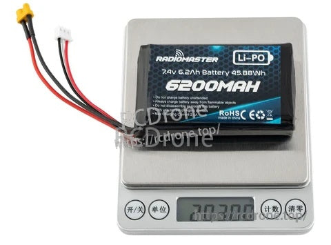 RadioMaster 7.4V 6200mAh LiPo battery on digital scale, 203g weight with XT30 and balance lead