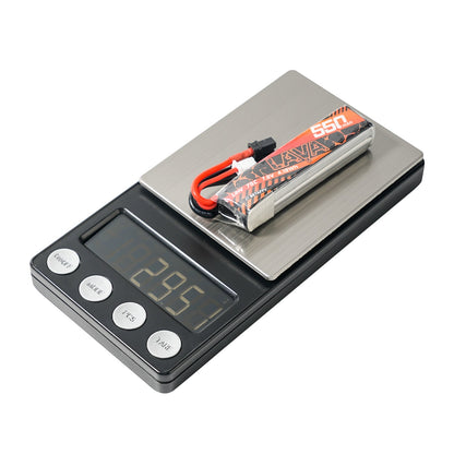 Single LAVA 550mAh battery shown on digital scale, weight display reads 28.65 g