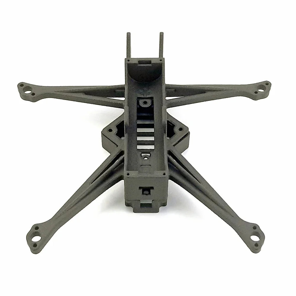 Front view of FPV drone frame with long arms and center spine opening for electronics stack