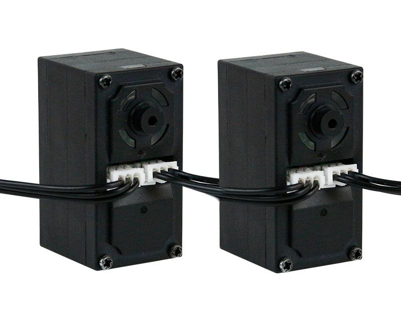 Rear view of serial bus smart servos showing daisy-chain cable connectors and wiring