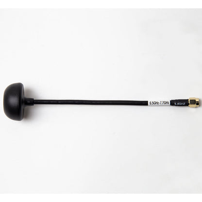 Side profile of mushroom FPV antenna with SMA connector and printed frequency band markings on cable