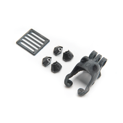 OddityRC XI25 Pro O3 related kit parts with 3D-printed camera mount, spacer blocks, and slotted plate