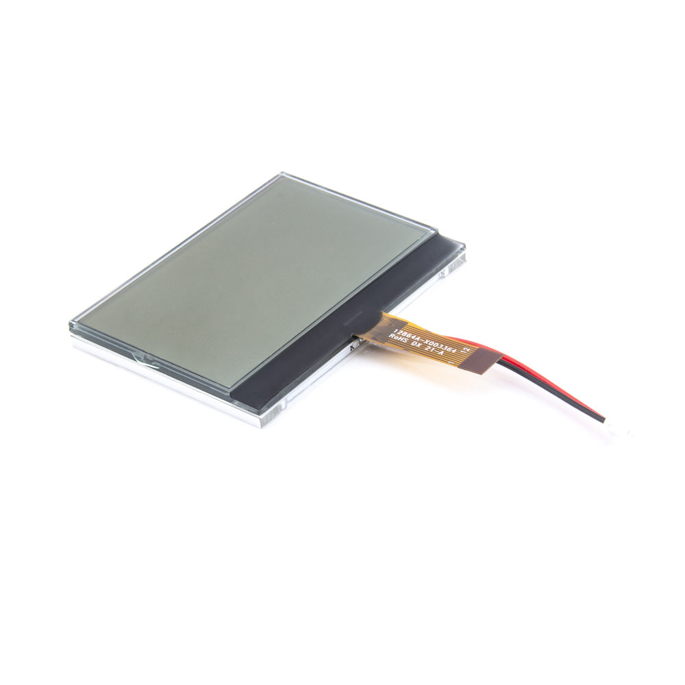 Angled view of TX12 LCD display module, showing screen thickness and attached flex ribbon lead
