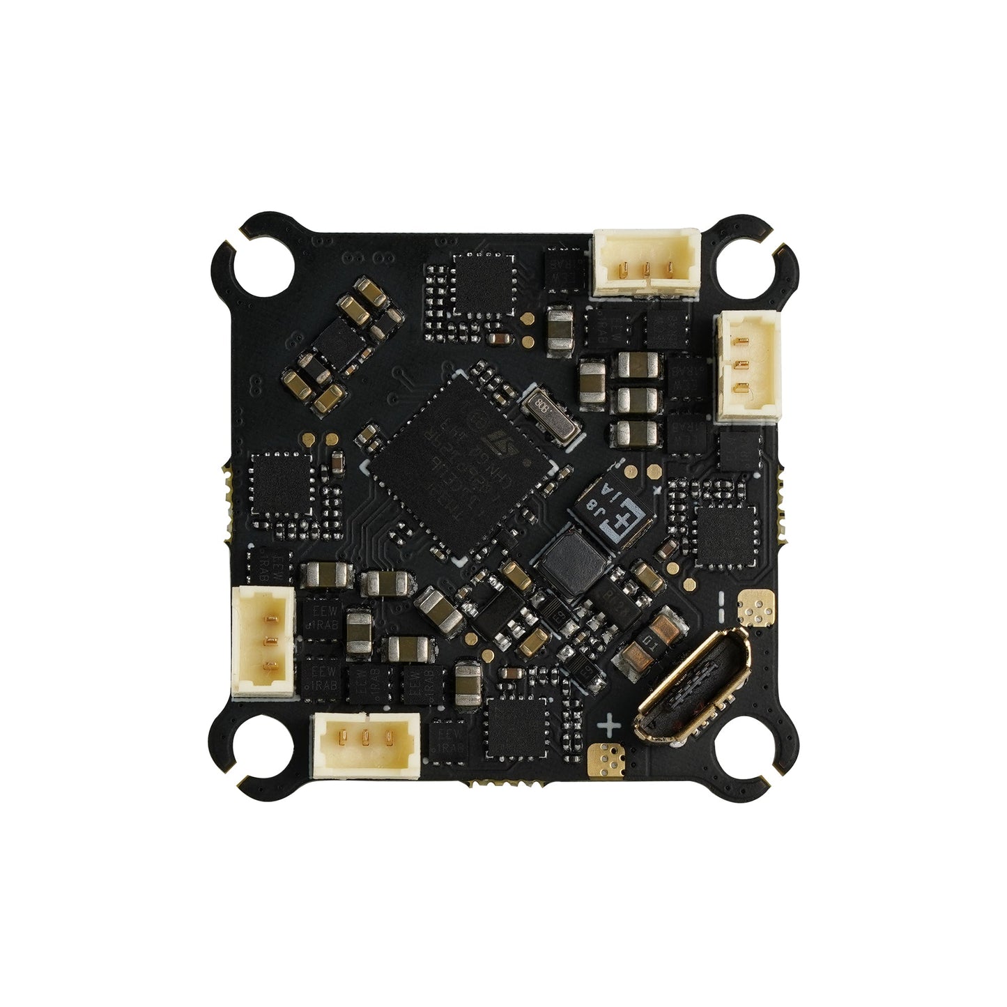 Bottom view of AIO flight controller with JST plugs, USB connector, and ESC components
