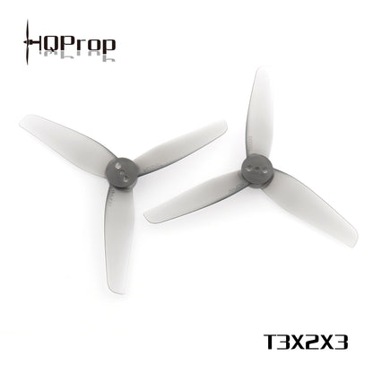 HQProp T3X2X3 translucent gray 3-blade 3in propellers with printed model label on white