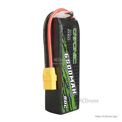 Side view of Ovonic Rebel 3S LiPo battery showing wire exit, balance lead, and yellow XT90 plug