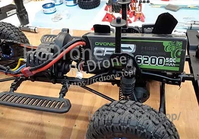 Ovonic 7.4V 6200mAh hardcase LiPo installed in an RC truck battery tray with Deans (T) connector