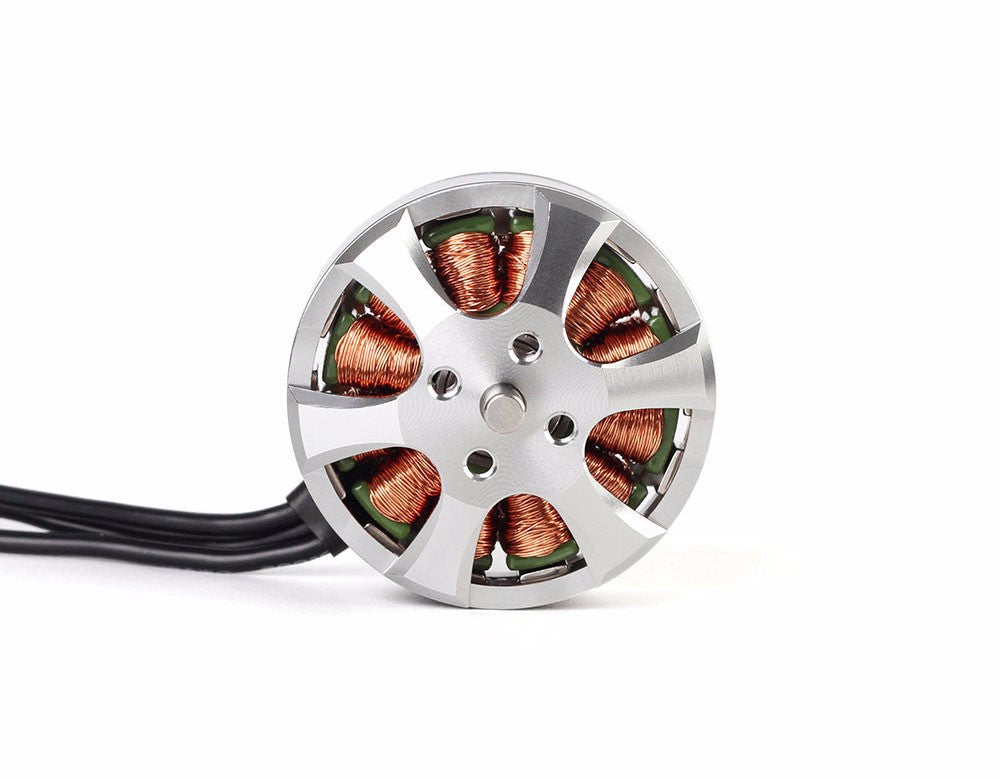 T-Motor brushless outrunner motor close-up with silver housing, exposed copper windings and three phase wires