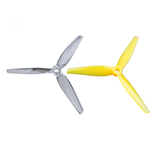 HQProp ETHIX P3.3 Mango Lassi 5.1in 3-blade FPV propellers, yellow and clear props side by side
