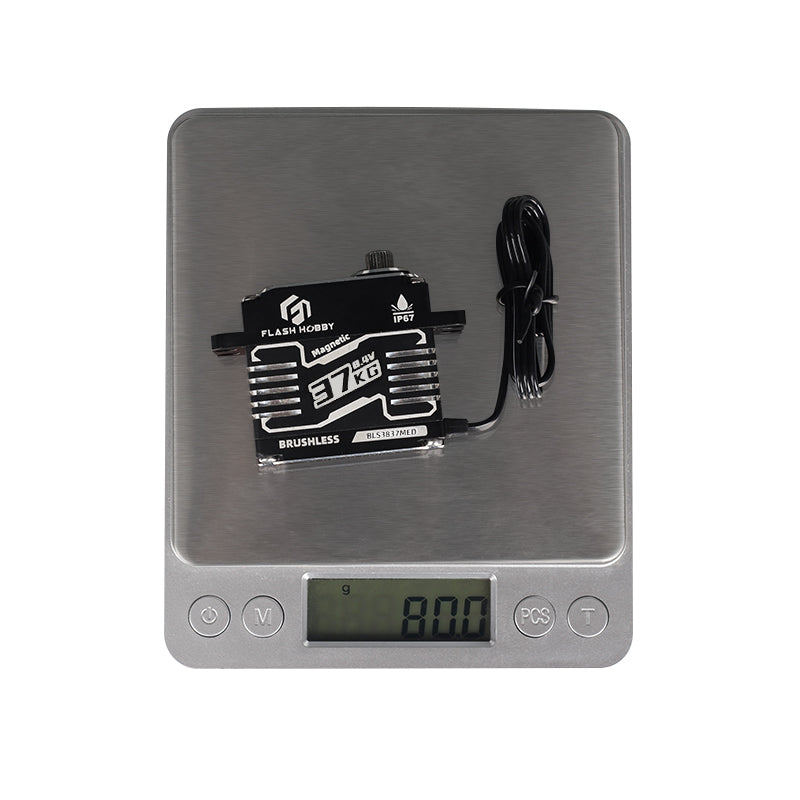 Flashhobby BLS3837MED Servo, Flashhobby BLS3837MED brushless servo on a digital scale, showing 80.0 g with attached lead wire