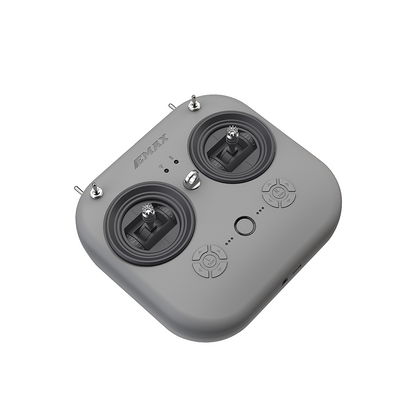 Angled top view of EMAX E8 transmitter showing control sticks, buttons, and compact square body