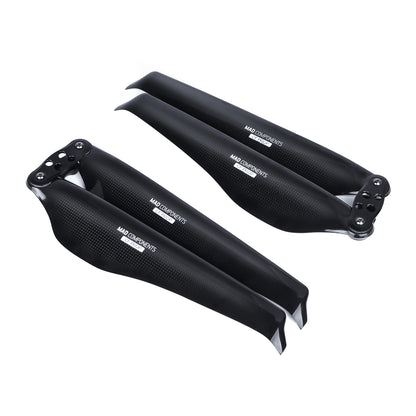 MAD FLUXER Pro glossy carbon fiber folding propeller blades with hub mounts, black with MAD Components branding