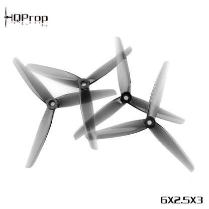 HQProp tri-blade propellers arranged as a set, with visible 6X2.5X3 size marking and logo