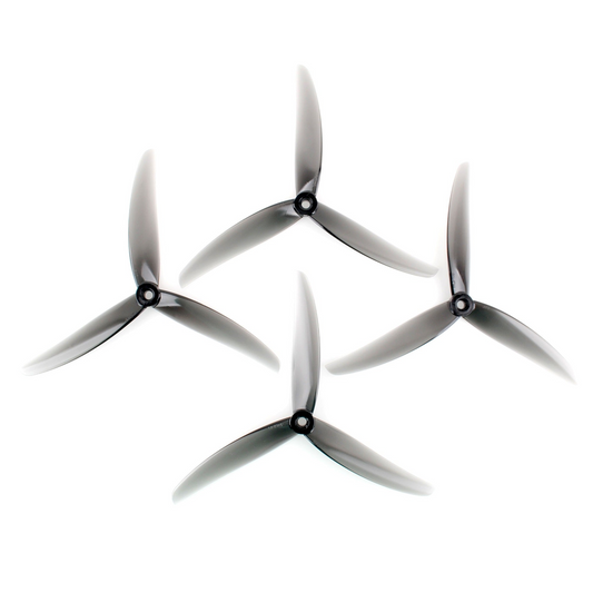 HQProp J75 7X5X3 tri-blade propeller set, four translucent grey 3-blade props on white