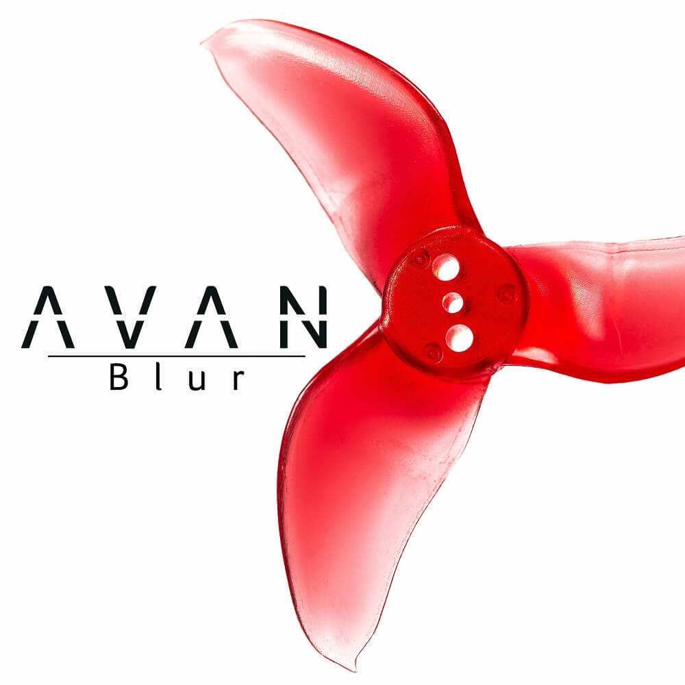 Close-up of AVAN Blur 3-blade propeller in translucent red with hub mounting holes