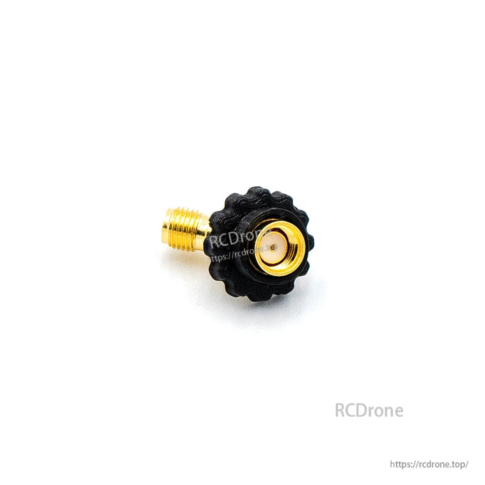 Side view showing RP-SMA male threaded connector on 45-degree elbow adapter with knurled grip