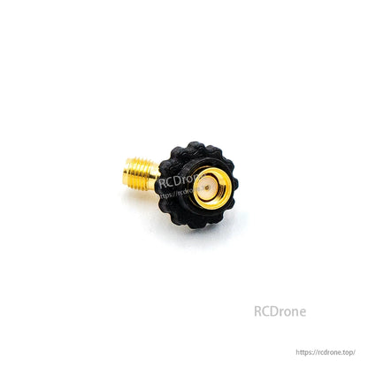 Side view showing RP-SMA male threaded connector on 45-degree elbow adapter with knurled grip