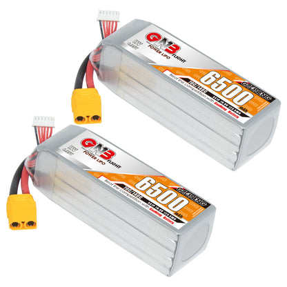 Two-pack of GNB 6500mAh HV LiPo batteries with XT90 connectors and balance leads, angled view