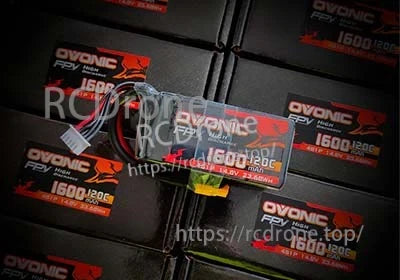 Four Ovonic 1600mAh 4S 120C LiPo packs arranged together for FPV racing and freestyle builds