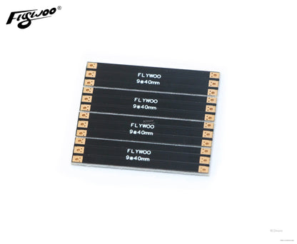 Set of four FLYWOO 9×40mm frame arm boards with solder pad ends for FPV drone builds