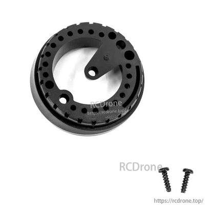 Two included black mounting screws shown with matching adapter ring for set