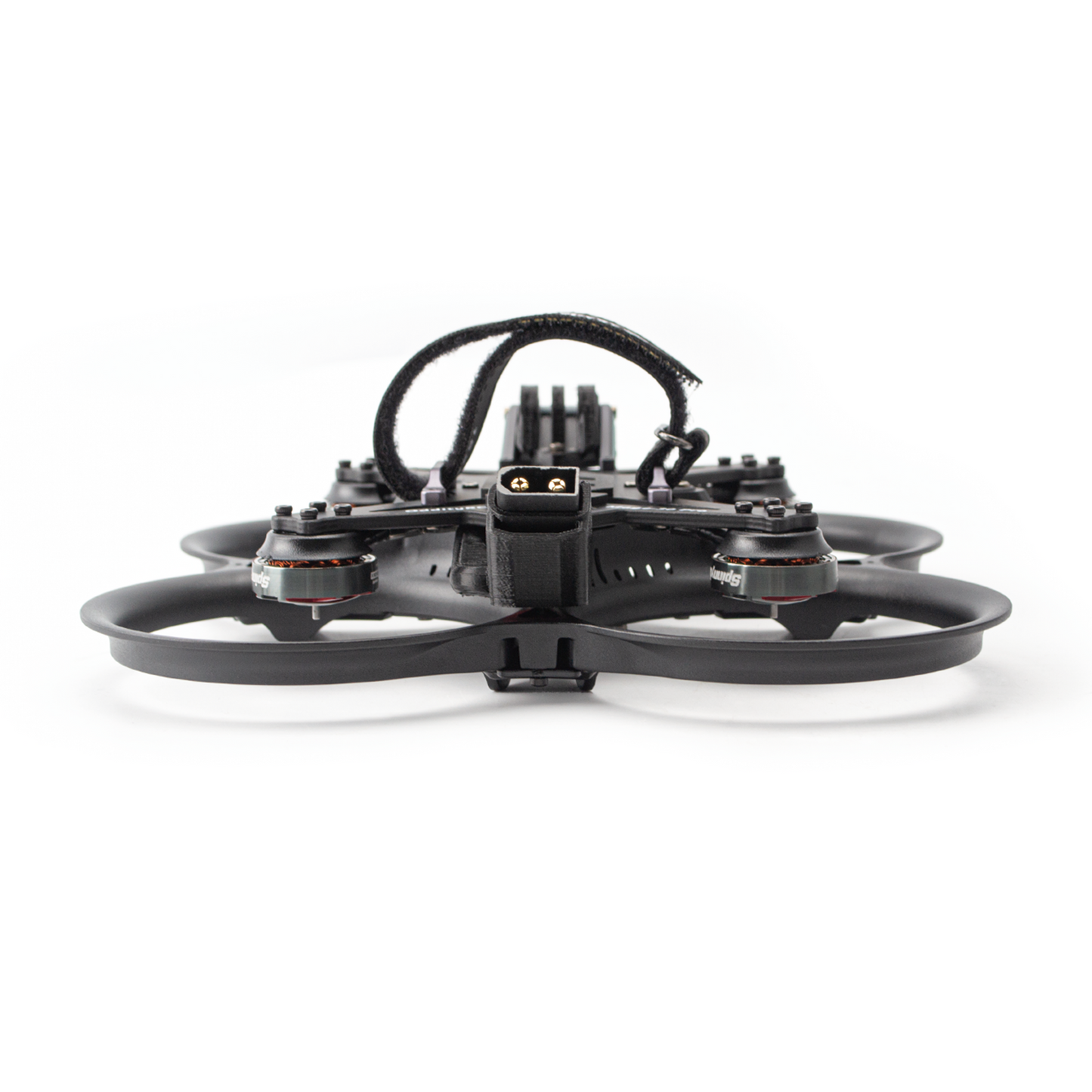 Rear view of ducted FPV drone showing battery lead exit and motor layout in guards