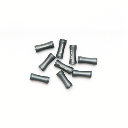 Top view of multiple OddityRC branded aluminum standoffs, black anodized finish
