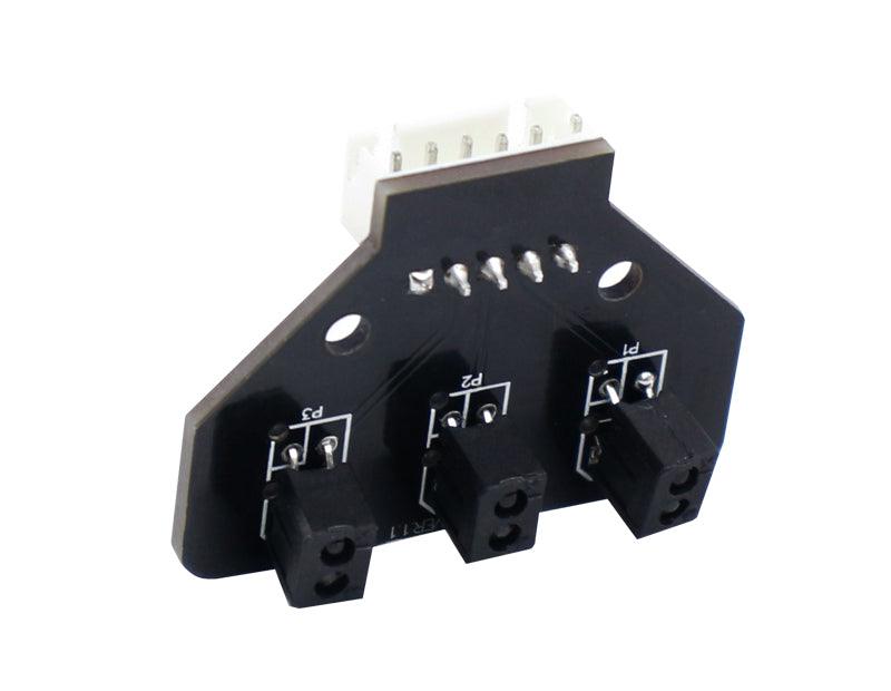 Rear angled view of the infrared tracking sensor board showing underside of three sensor housings