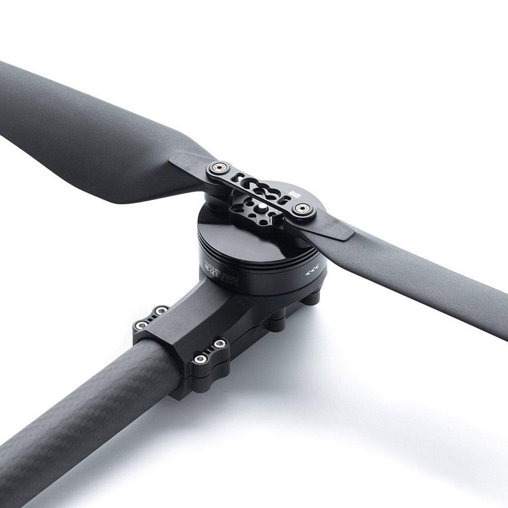 MAD StableCore A510 Drone Arm, Carbon fiber drone arm with mounted motor and two-blade propeller, close-up of the hub and screws