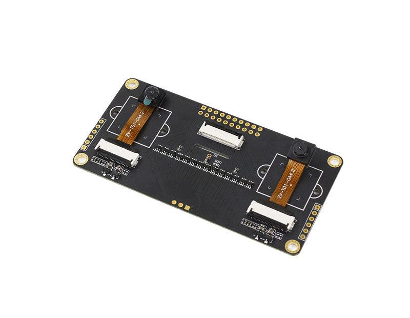 Angled view of dual camera PCB showing both lenses, mounting holes, and connector layout