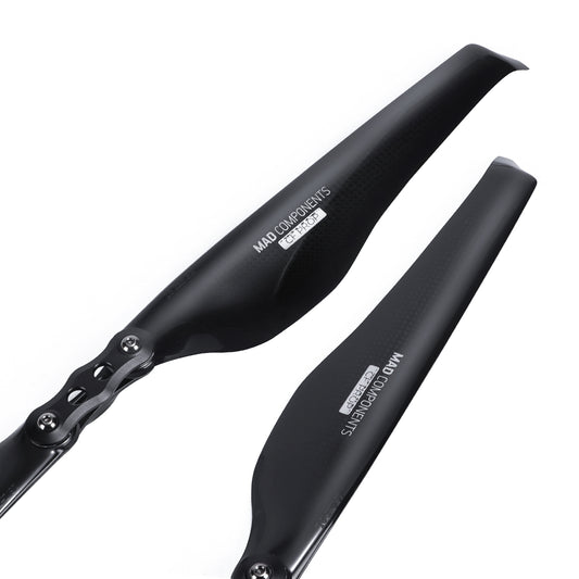 Black MAD Components folding propeller blades with hinge hub hardware, glossy finish, for drone or UAV use