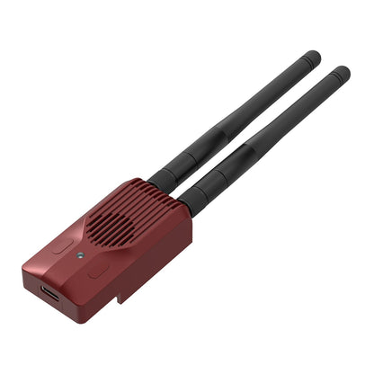 SuperG Nano transmitter module in red housing with two antennas, angled front view