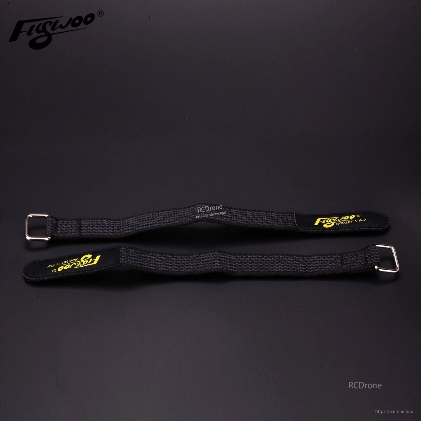 4pcs FLYWOO Kevlar Battery Strap, Two black Flywoo Kevlar battery straps with metal buckles and yellow Flywoo branding on a dark surface