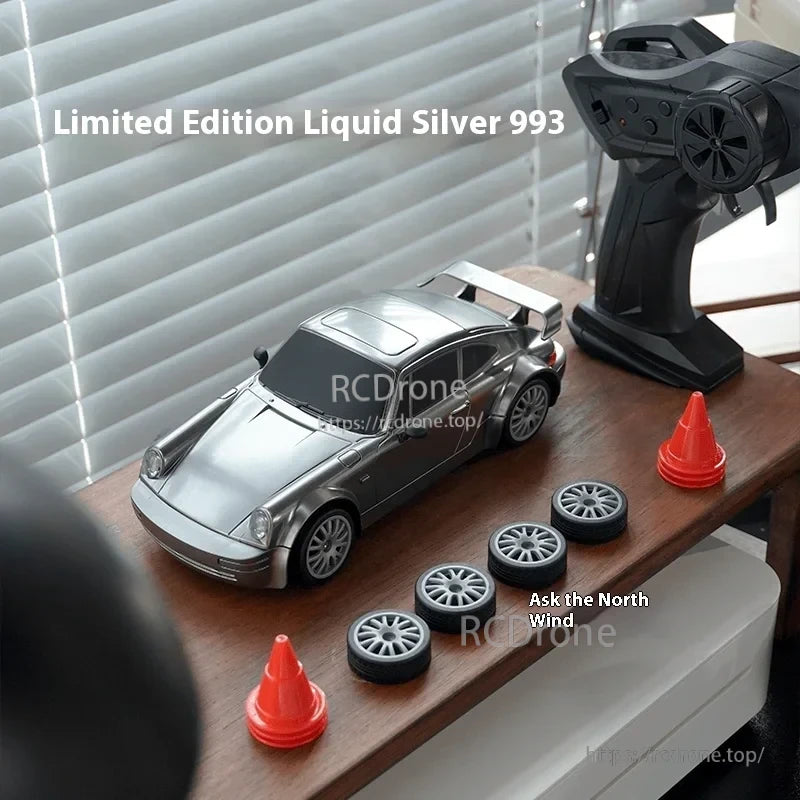 4WD Remote Control Car, A limited edition liquid silver 993 4WD RC car, including spare tires and cones.
