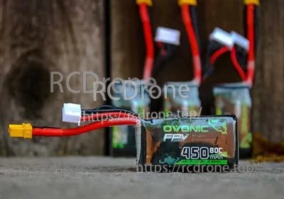 Close-up of Ovonic FPV High Discharge 450mAh 80C 4S LiPo battery with XT30 and JST-XH balance plug