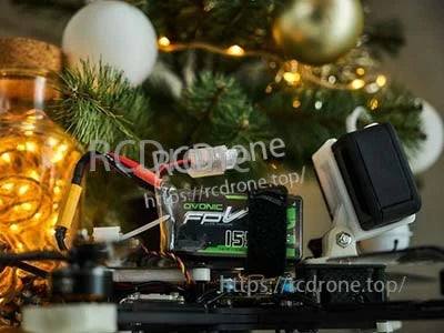 Ovonic 4S 1550mAh LiPo mounted on an FPV drone frame with XT60 and balance lead