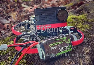 Ovonic 650mAh 4S 14.8V 80C LiPo battery with XT30 mounted on a small FPV cinewhoop drone
