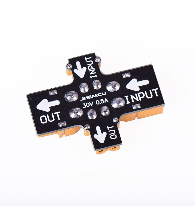 Underside of JHEMCU RC smoke stopper showing INPUT/OUT arrows and 30V 0.5A marking